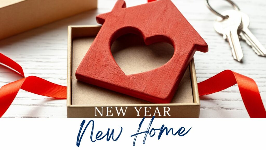 House in a box with keys and ribbon.New year, new home. Are you thinking of selling and buying in 2023? Contact DNG Wicklow and get the advice you need and get your dream house